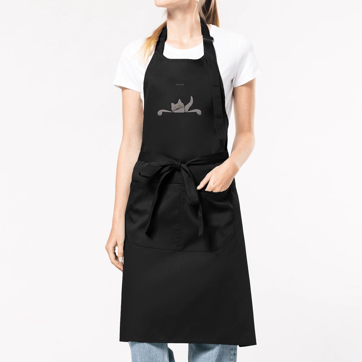 Cat looks over It on a Apron